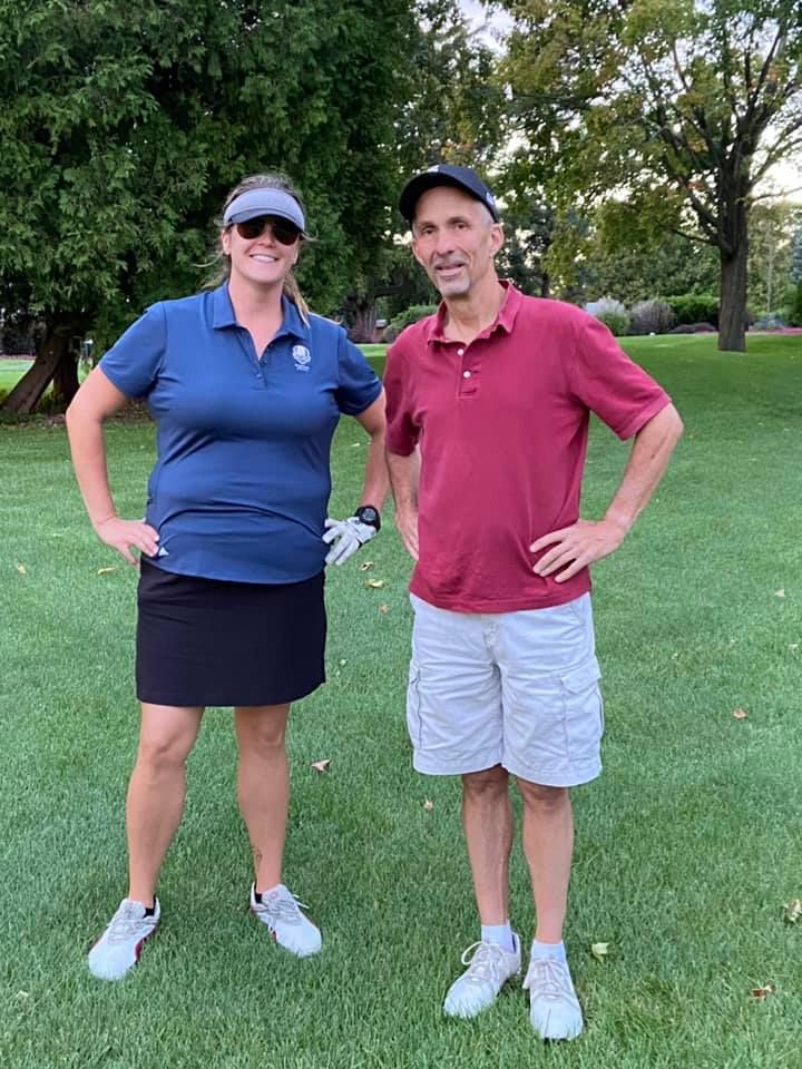 Holly and Vic playing golf, 2021 - we do more than just run!